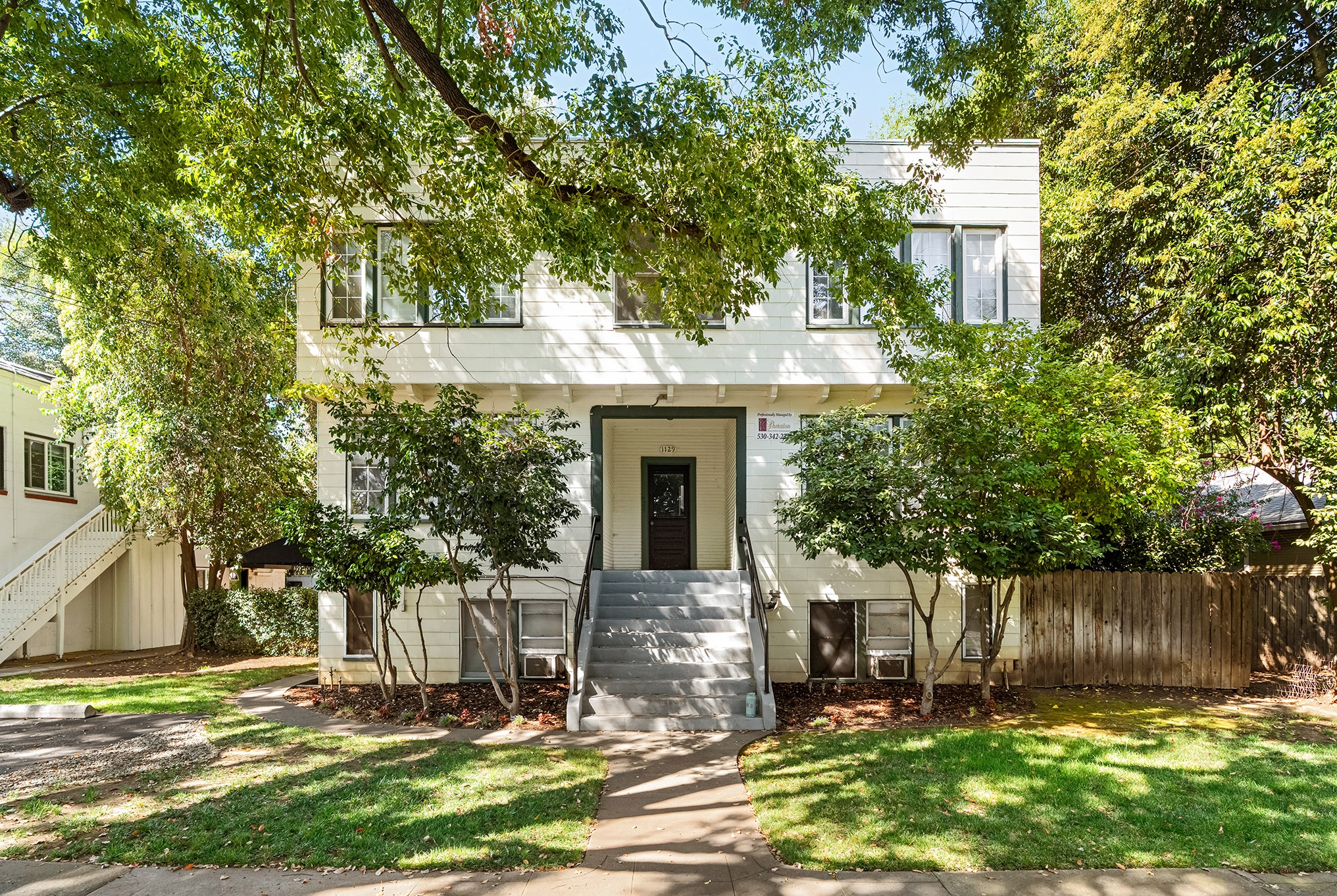Entry stairway and front elevation of the 1129 Magnolia Avenue building