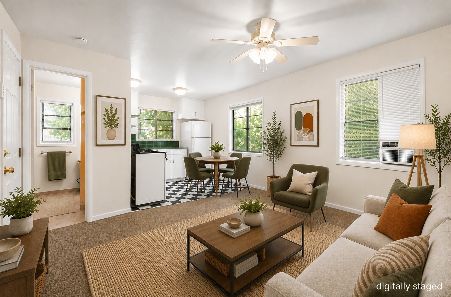 Virtually staged living room with large windows in a Magnolia Apartments unit